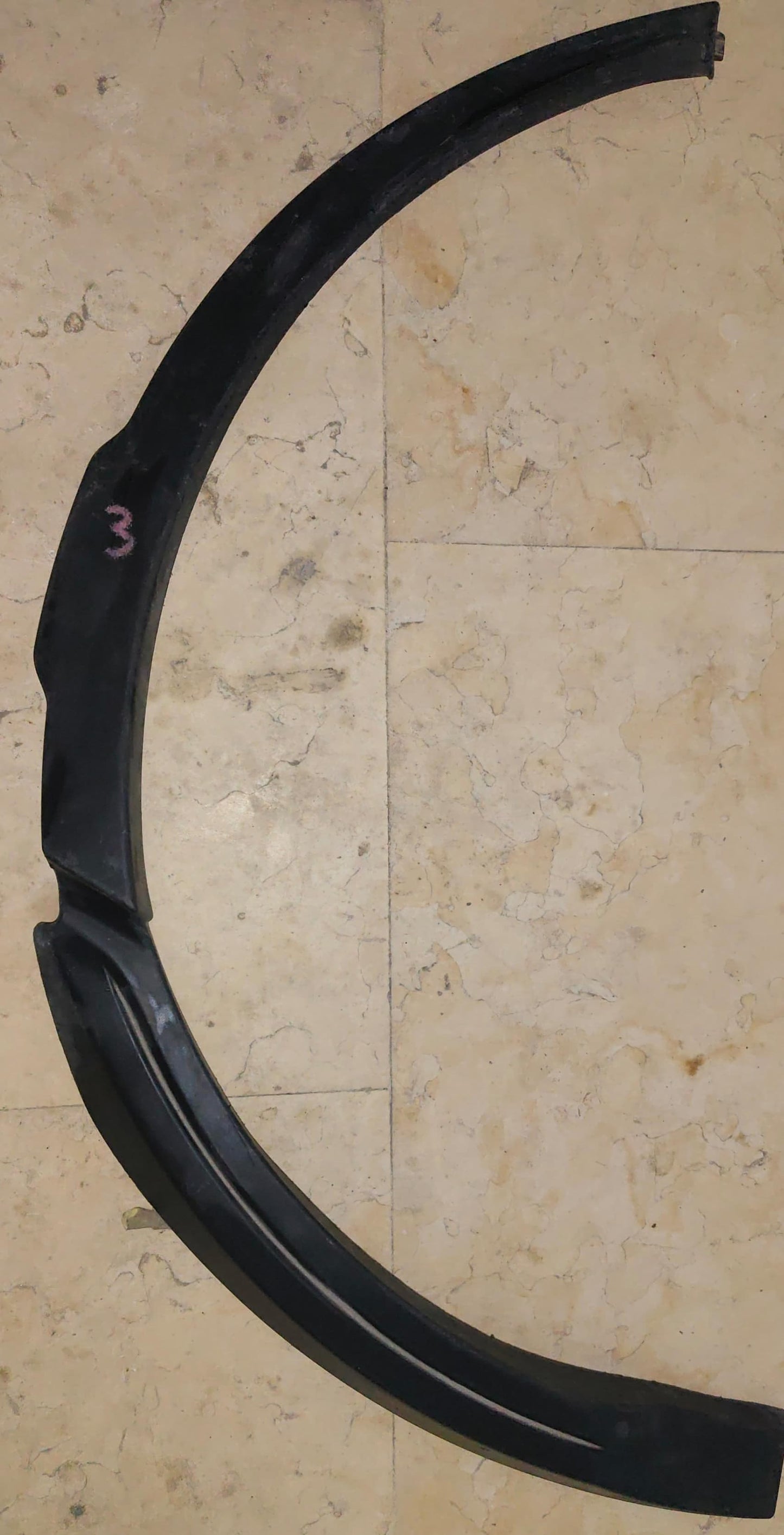 Left rear wheel Arch Moulding - USED